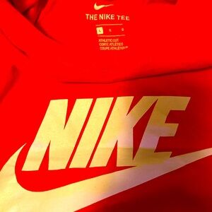 Orange Nike short sleeve shirt